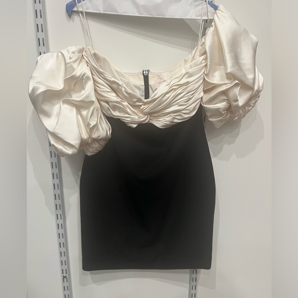 Beautiful off or on shoulder dress. Wore just once. Almost new